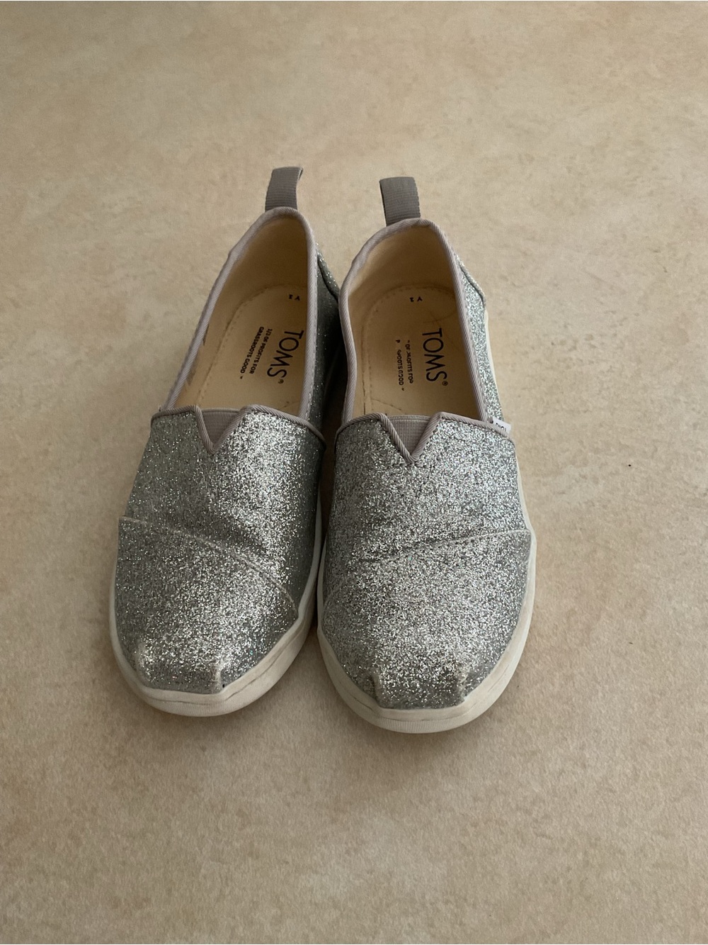 TOMS Kids Silver Glitter Slip On Sneakers